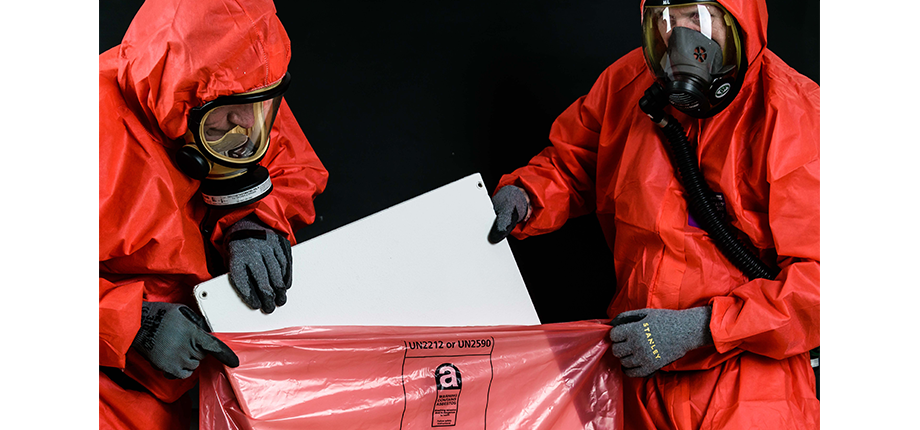 Asbestos being disposed of